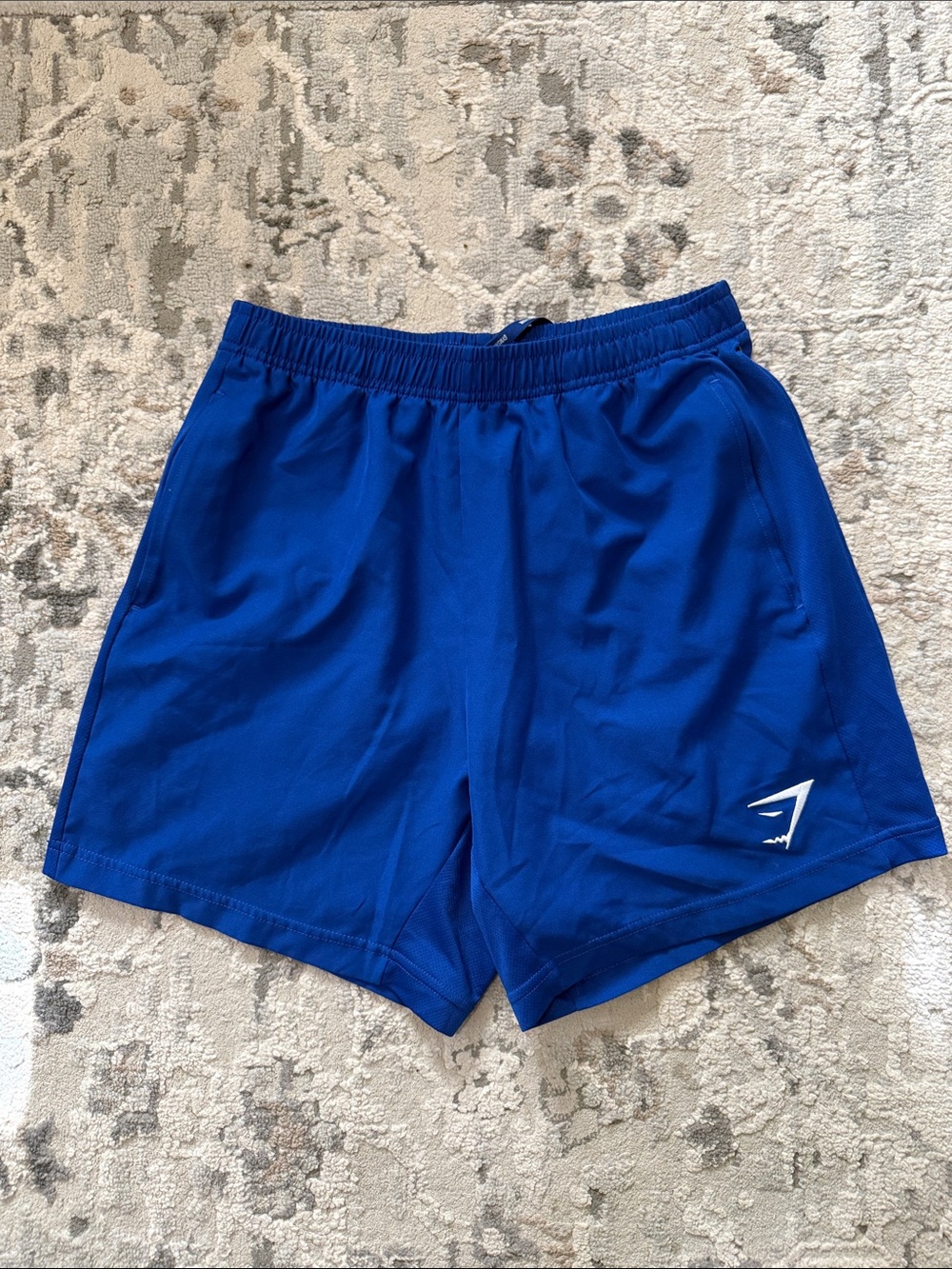 Gymshark Men’s Athletic Shorts in Blue with White Logo